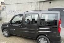 Fiat Doblo I 2005-2010 Barres de Toit Noires Base standard, pieds en plastique photo 2