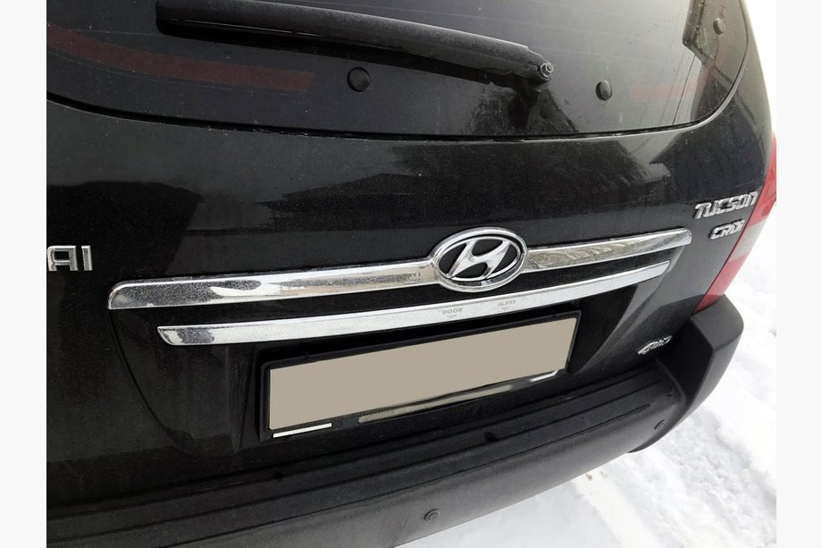 Hyundai Tucson JM 2004- Encadrement de plaque d'immatriculation (plastique) Image