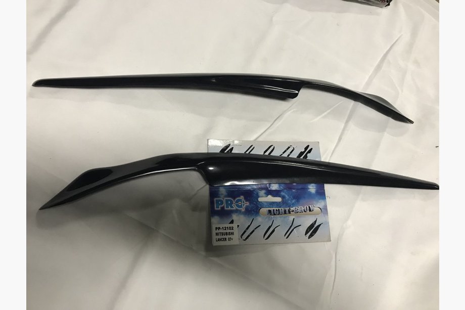 Mitsubishi Lancer X 2008- Paupières de phares (2 pcs, à peindre) Image