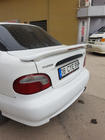Hyundai Accent 1994-1999 Aileron Meliset (apprêté pour peinture) photo 1