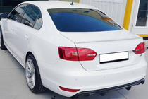 Volkswagen Jetta 2011-2018 Aileron OEM (apprêté pour peinture) photo 1