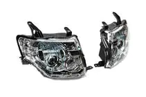 Mitsubishi Pajero Wagon IV 2006-2021 Phares Avant OEM (2 pcs) photo 2