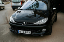 Peugeot 206 1998-2024 Lame avant inférieure (à peindre) photo 1
