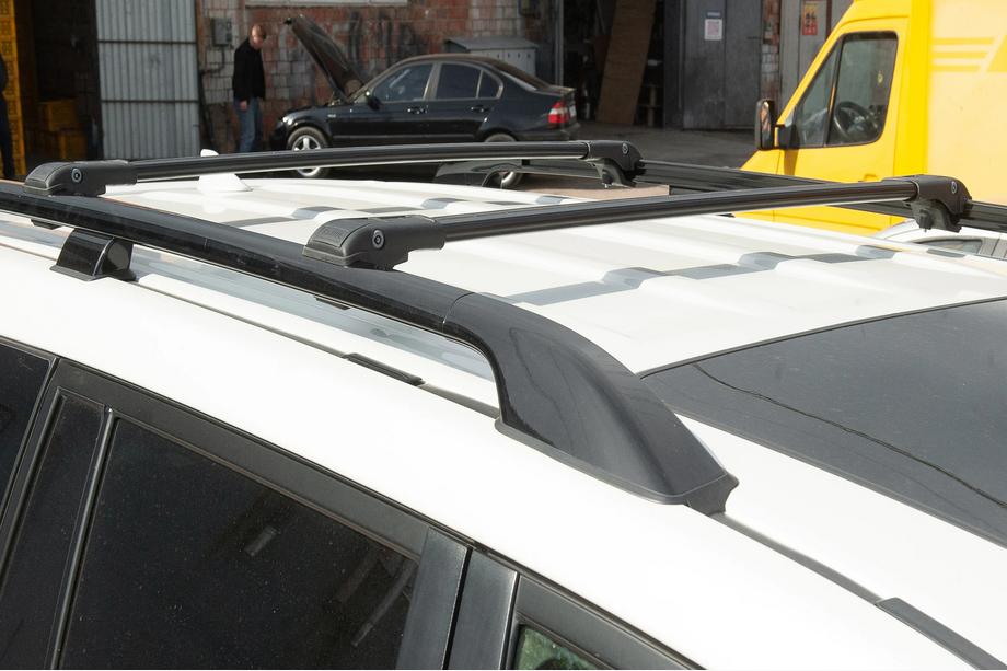Kia Carnival 2021- Barres de toit (transversales) pour barres de toit standards verrouillables WingBar V1 (2 pcs) Photo 5
