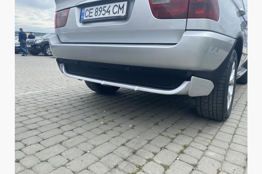 BMW X5 E53 1999–2006 Cache pare-chocs arrière (apprêté pour peinture) Image