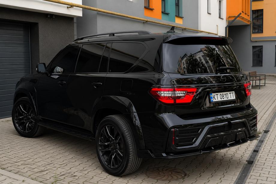 Nissan Patrol Y62 2010-2024 Barres longitudinales de toit noires (Aluminium) Photo 1