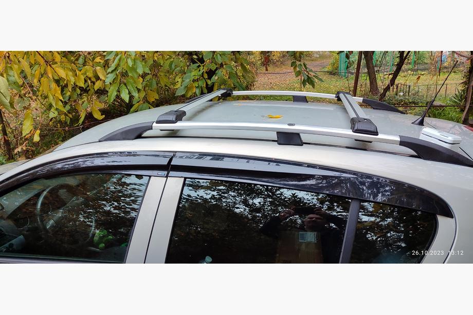 Opel Astra H 2004-2013 Barres de toit pour barres longitudinales standards verrouillables (2 pcs) Gris Image