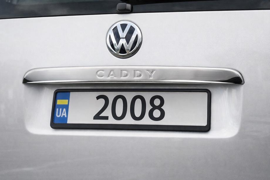 Volkswagen Caddy 2004-2010 Baguette chromée au-dessus de la plaque d'immatriculation (1 porte, inox) OmsaLine - Inox italien (avec inscription) Image