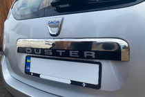 Renault Duster 2008–2017 Baguette supérieure en inox au-dessus de la plaque d'immatriculation photo 1
