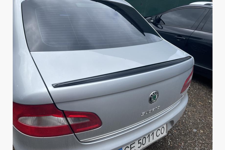 Skoda Superb 2009-2015 Spoiler LIP (Sunplex, noir) (115,8cm x 6,3cm) Image